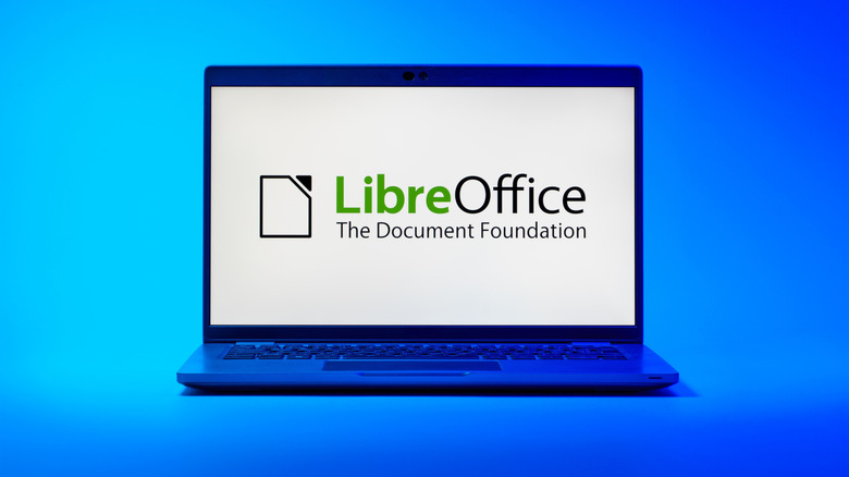 LibreOffice on a laptop screen on blue background