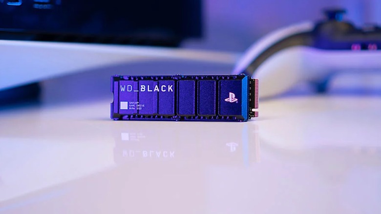 Officially licensed WD_Black internal SSD with PlayStation 5 and DualSense controller in background