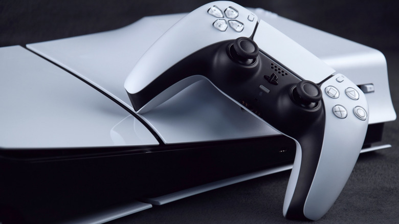 PlayStation 5 DualSense controller on top of a PS5