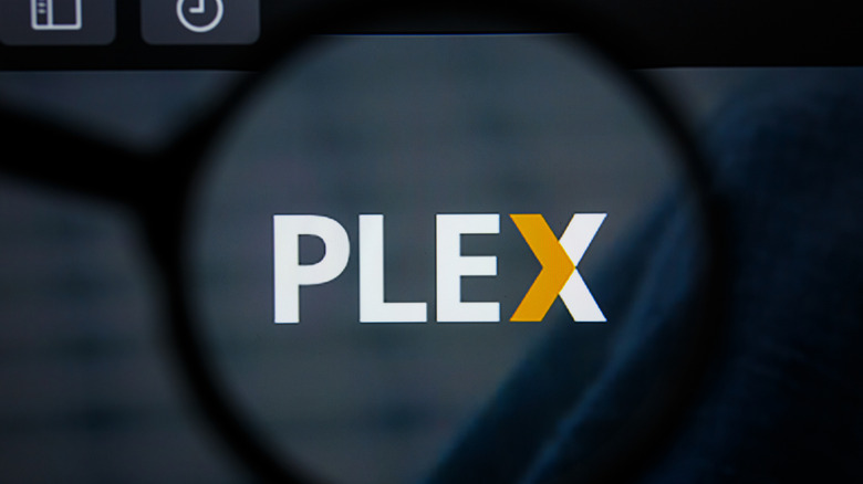 The Plex logo on a TV screen