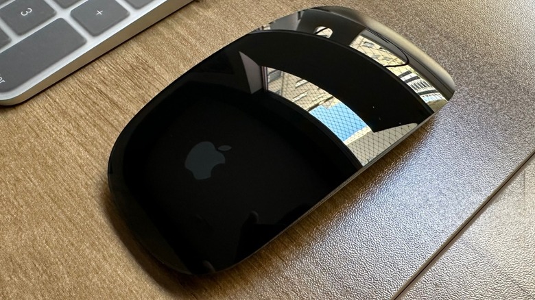 Close-up shot of Apple's Magic Mouse in black