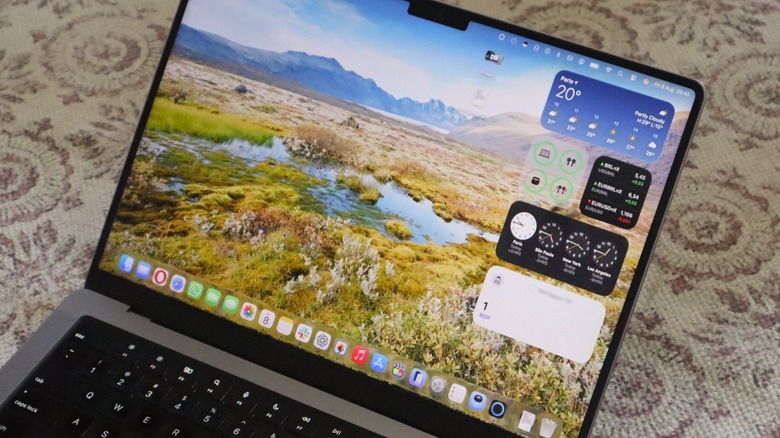 Portal app running as an animated wallpaper on a MacBook Pro