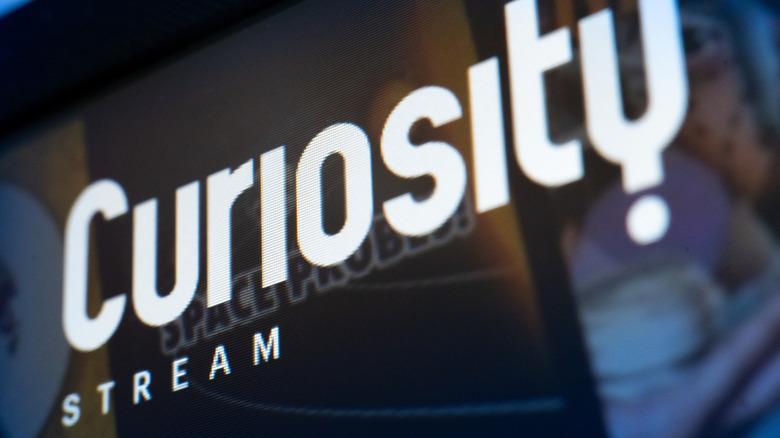 The Curiosity Stream logo on a TV screen