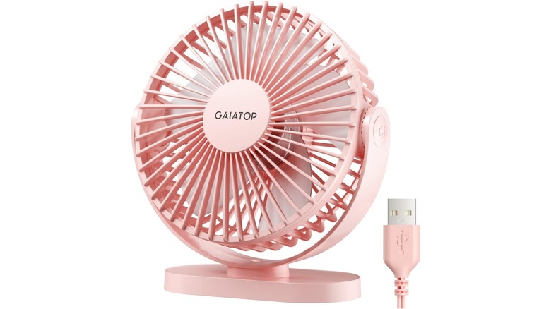 An Amazon promotional photo for the pink Gaiatop USB Desk Fan, the image also showcases the device's USB-A capabilities