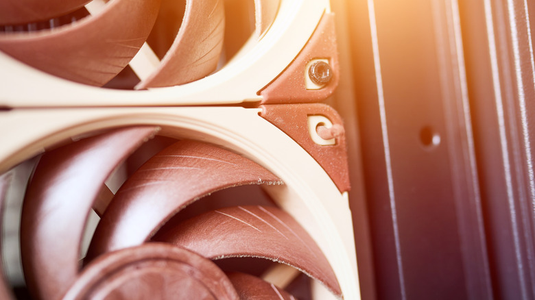 Fans on a PC covered in dust.