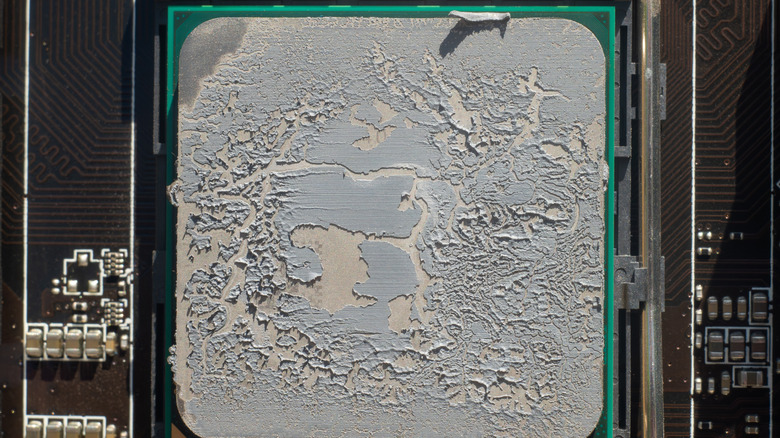 Dried, crusty thermal paste on a PC component.