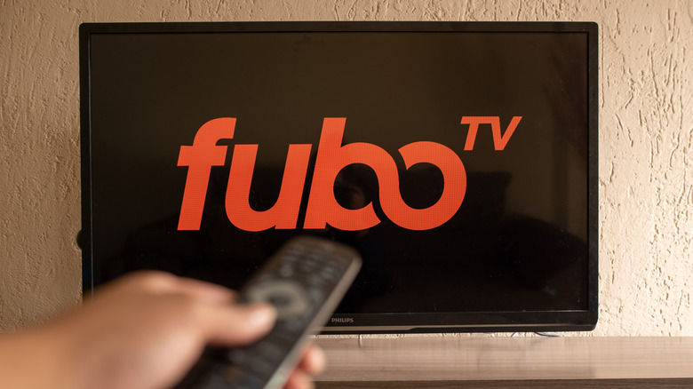 FuboTV logo in background on a TV