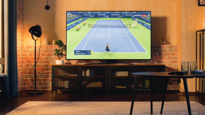 A Tennis match broadcasting live on a TV