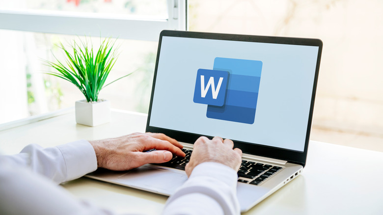 Microsoft Word logo on a laptop screen