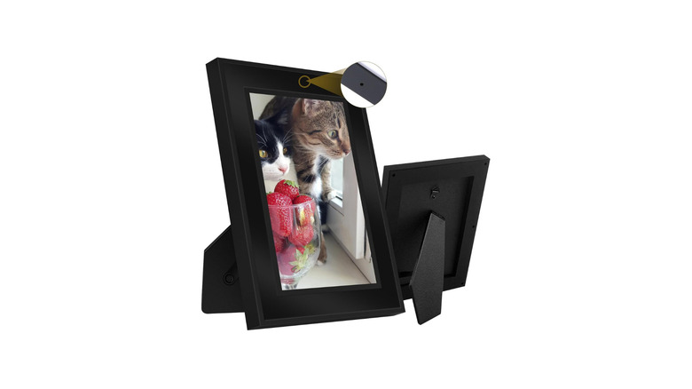 A standard photo frame with a hidden camera inside the frame