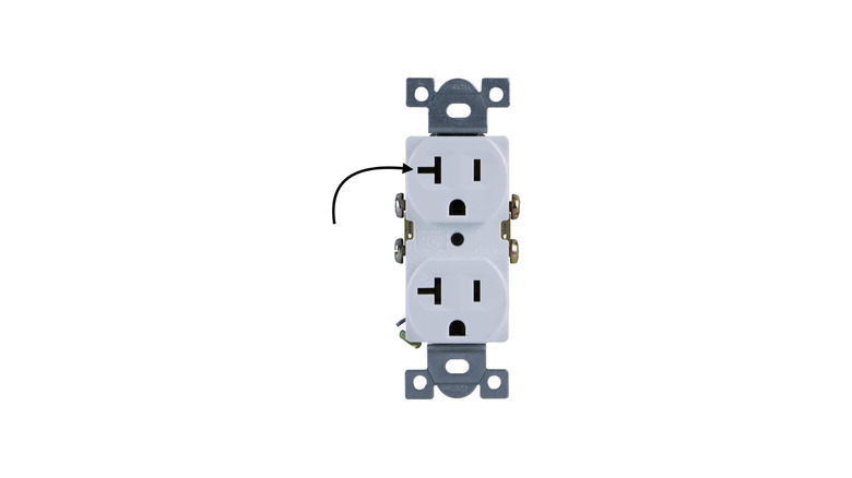 A standard looking wall outlet with a hidden camera inside
