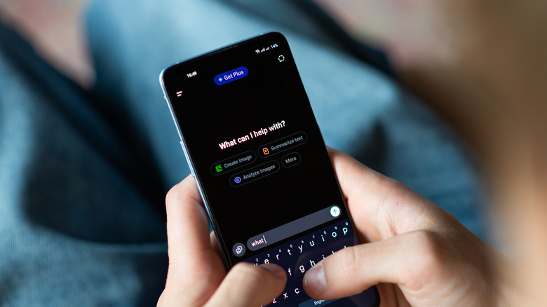 person typing in the chatgpt mobile app