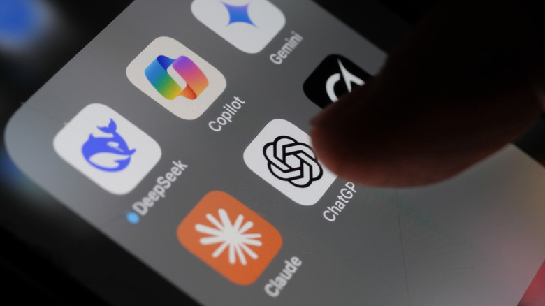 a finger tapping the chatgpt app icon on a phone screen