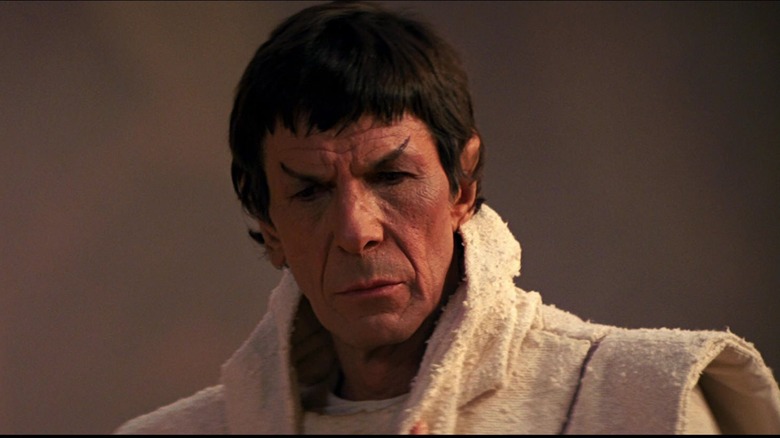 Leonard Nimoy as Spock, in a white robe looking contemplative.