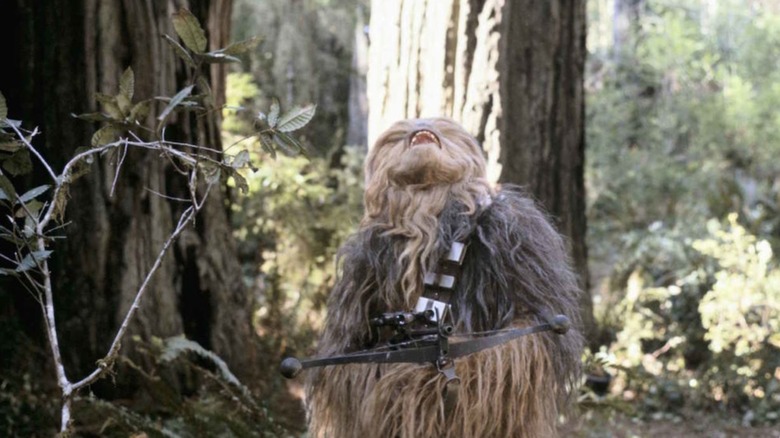 Chewbacca roaring up a tree on Endor