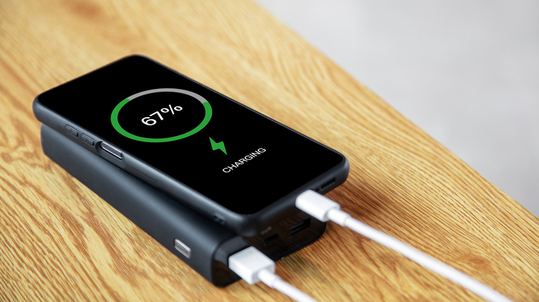 Using a power bank to charge an iPhone