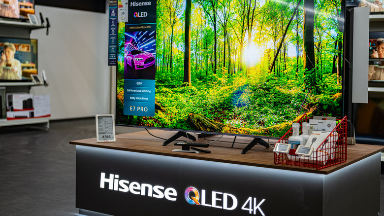 A Hisense QLED 4K TV on display.