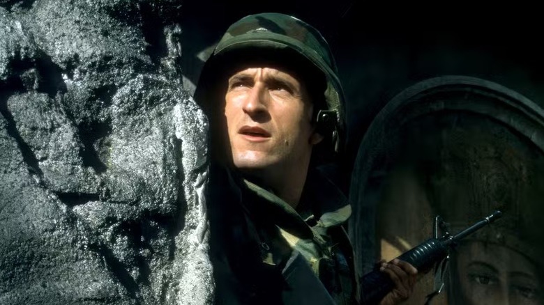 Frank (Jonathan LaPaglia) wearing combat gear on "Seven Days."