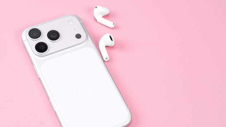 iPhone next to AirPods without case