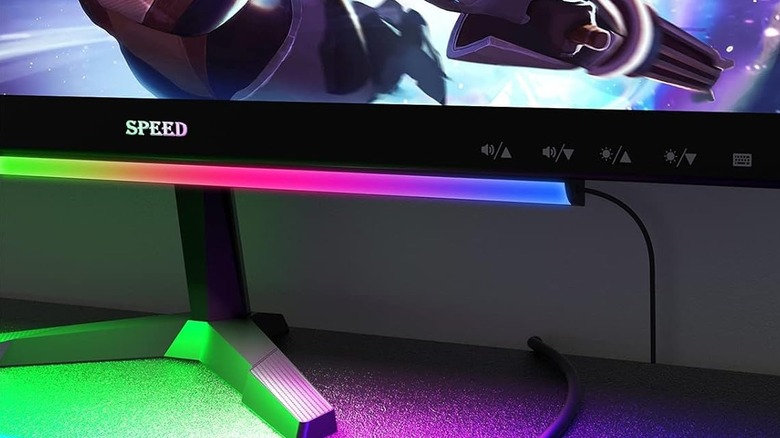 ABCidy Under Monitor Light Bar installed under monitor showing rainbow lights