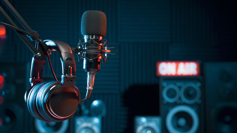 Professional microphone and headphones in studio