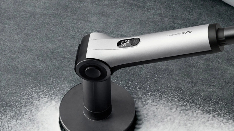 Cleaning a floor with the Hoto Flexi Cordless Spin Scrubber.