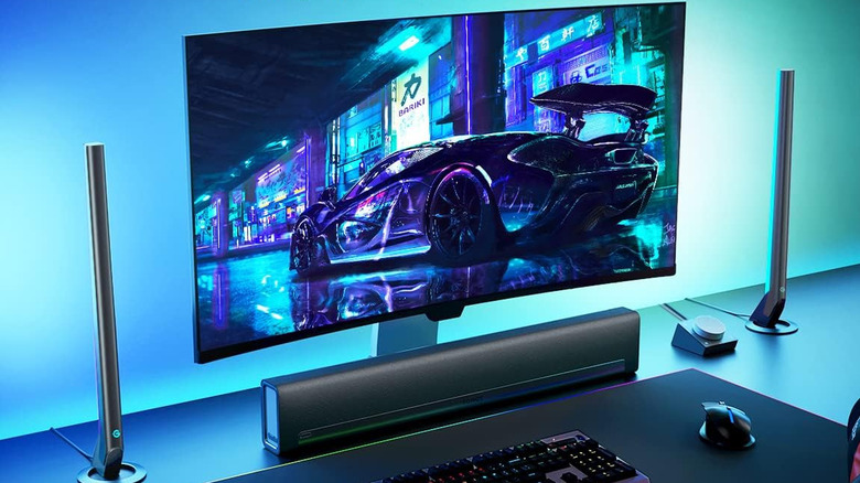 Govee Gaming Light Bars H6047 beside a monitor with blue ambient lighting.
