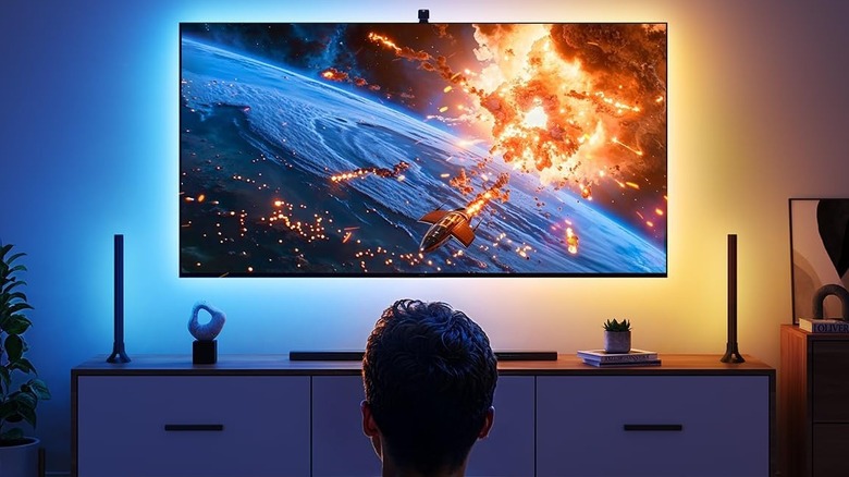 A Govee TV Backlight 3 Lite system set up on a wall-mounted TV.