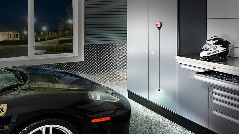 STKR Garage Parking Sensor installed in garage guiding parking car