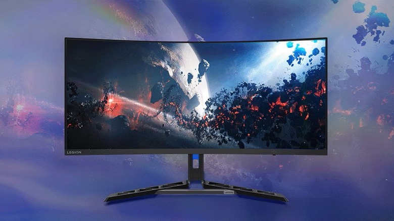 Lenovo Legion 34-inch curved WQHD monitor at 180Hz with colorful background.