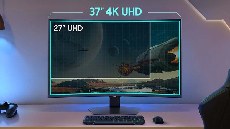 Samsung 37-inch Odyssey G7 4K curved monitor on desk.
