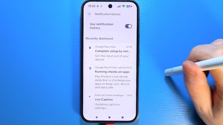 person toggling on Notification history