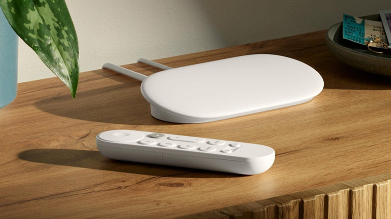 Google TV streamer placed of a wooden TV unit