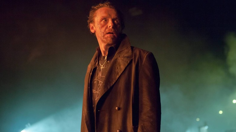 Simon Pegg looking behind him in The World's End