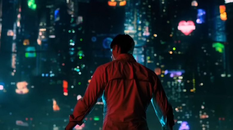 A scene from Altered Carbon with the protagonist overlooking a futuristic skyline