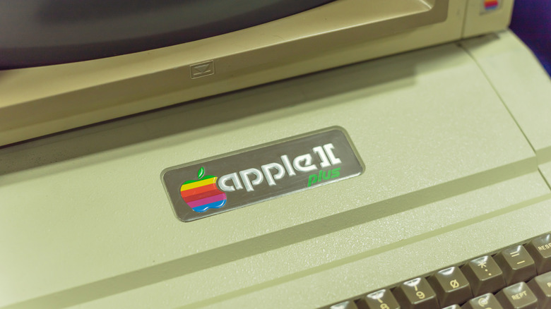 Close-up of the Apple II Plus logo on an old computer