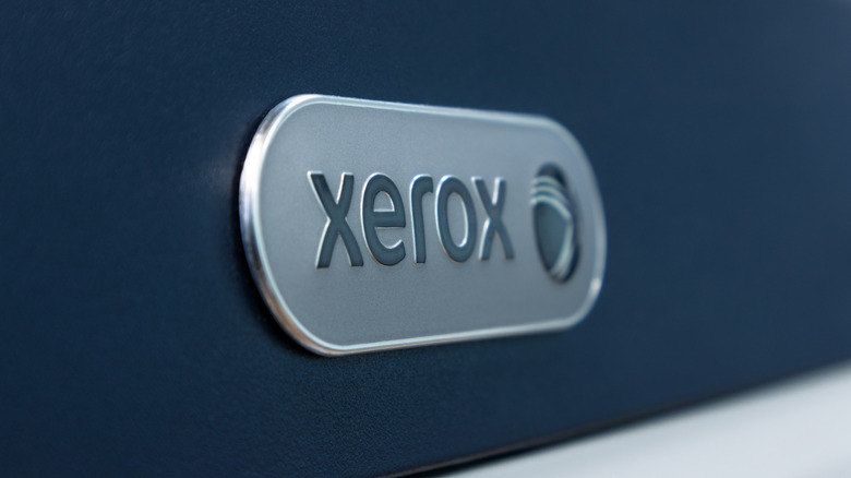 Close-up of the Xerox logo on an electronic device