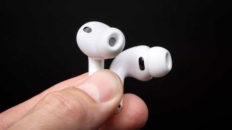 A person holding the Apple AirPods Pro 3.