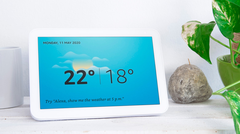 An Amazon Echo Show (older version) placed on a table.