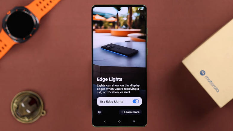 Motorola phone on table showing Edge Lights turned on