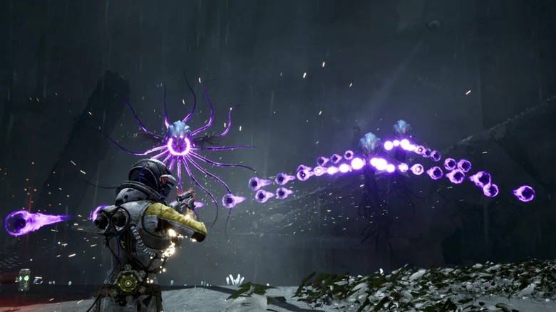 Protagonist dodging purple bullet orbs in Returnal