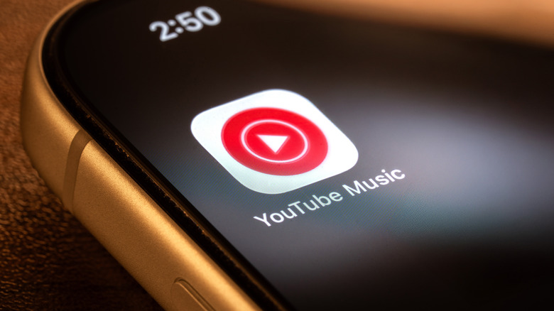 Phone showing YouTube Music app on home screen