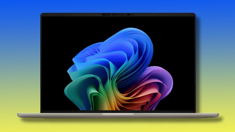 The Asus Zenbook A14 on a yellow to blue BestBuy-themed background
