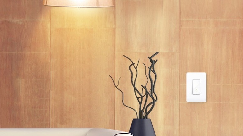 Kasa Smart Light Switch HS200 installed on wall close to lights