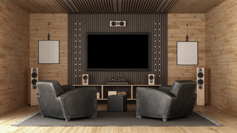 A home theater setup with soundproofing and audio components