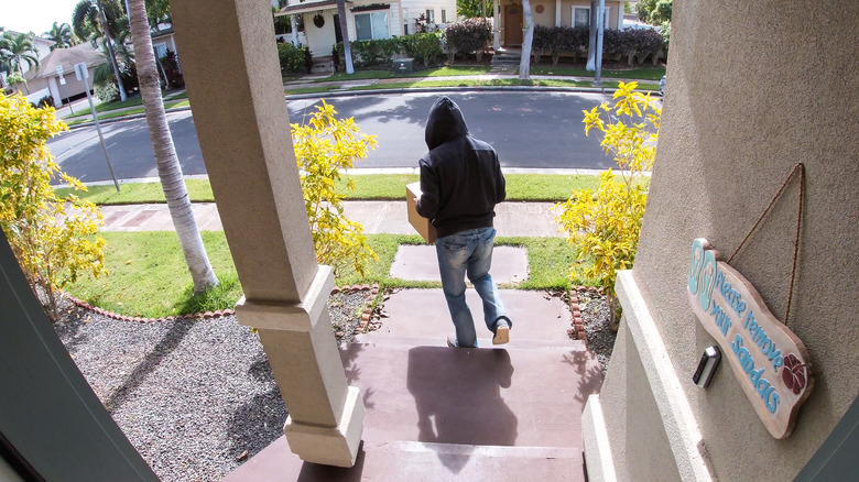 A package thief caught on camera by a video doorbell.