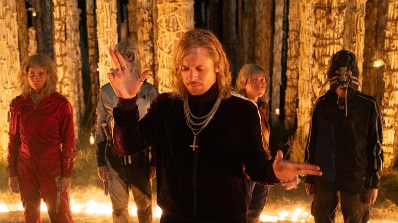 Maura Bird, Alfie Williams, Ghazi Al Ruffai, Jack O'Connell, and Erin Kellyman stood in the bone temple in 28 Years Later: The Bone Temple