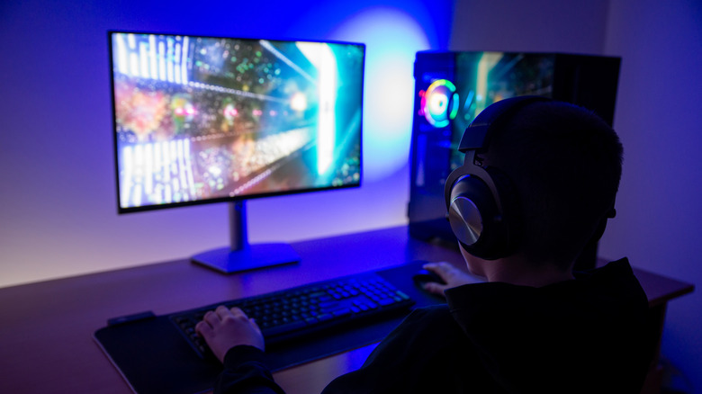 Man playing games on computer