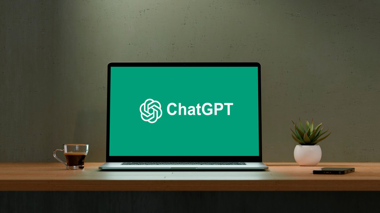 The ChatGPT logo displayed on a laptop screen.