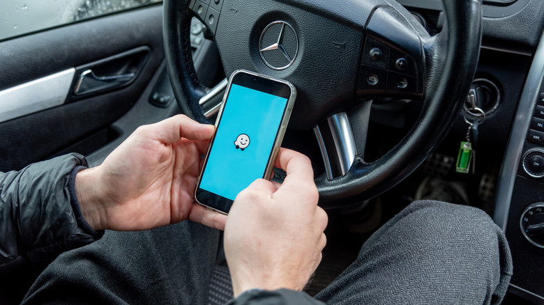 Smartphone navigator Waze Maps app for driver